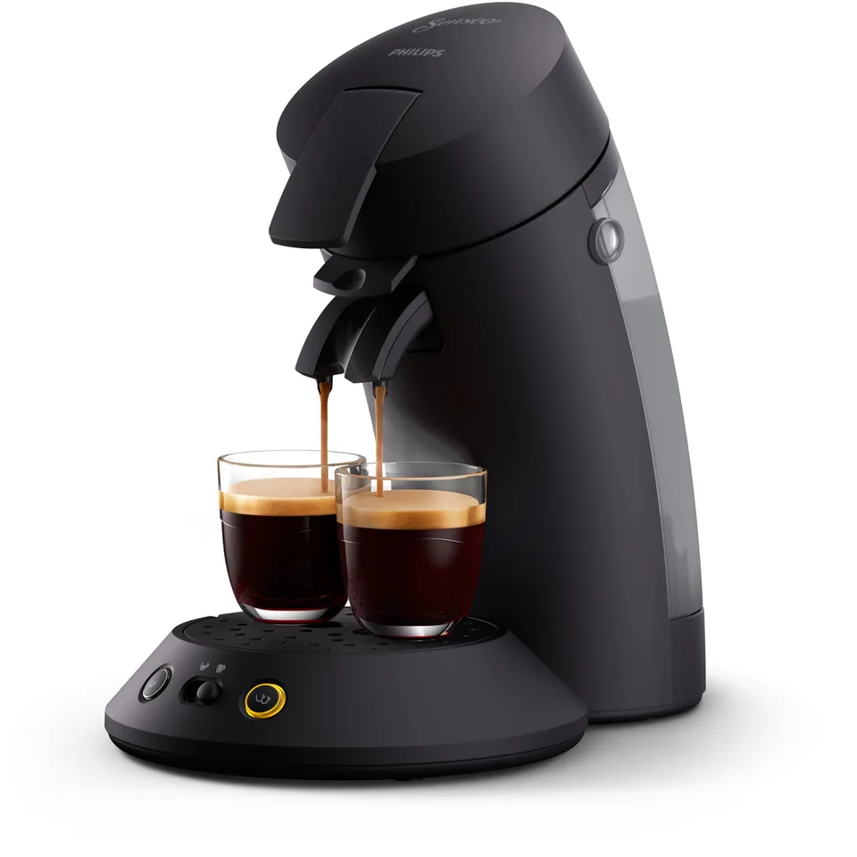 Product image of the matt-black SENSEO Original Plus CSA210/60 brewing two illustrative cups of coffee; not our own brewing test or proof that cups are supplied