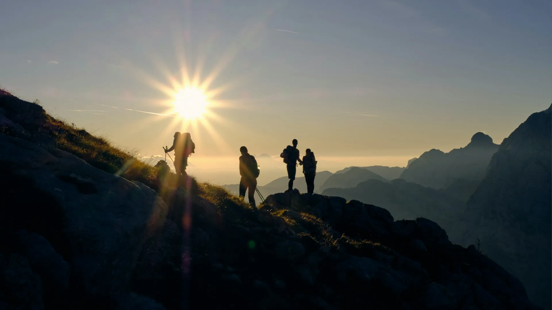 Hiker above the clouds